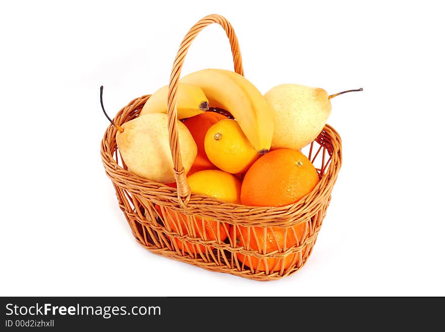 Fruits in basket on white background