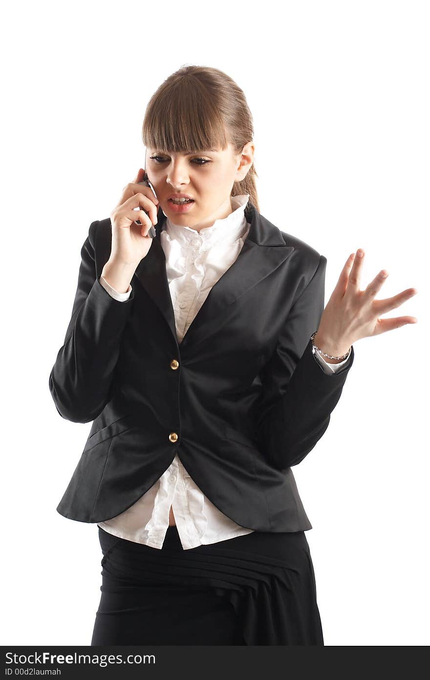 Beautiful Businesswoman during a telephone conversation - being very serious