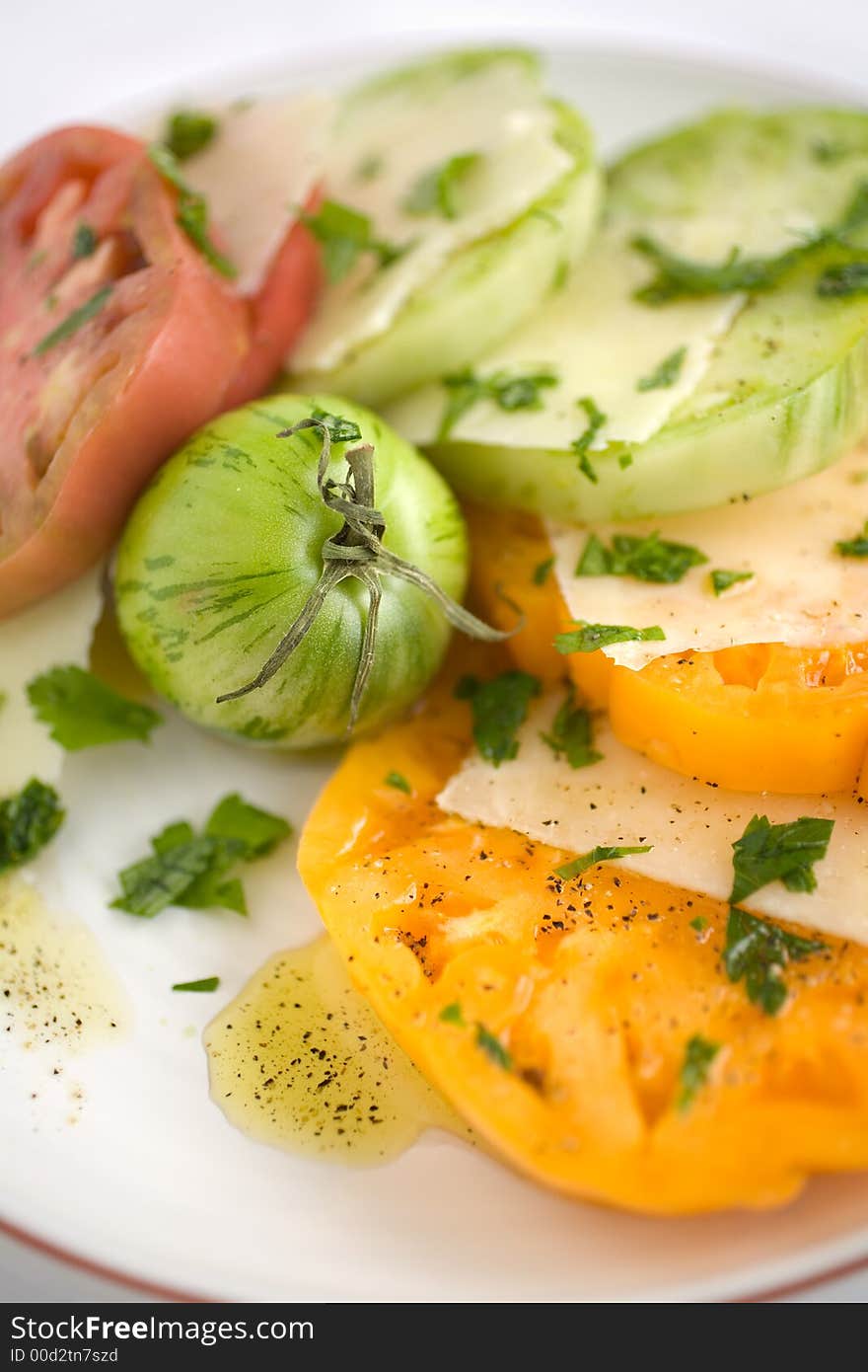 Heirloom Tomato Salad with shaved pecorino romano cheese and a drizzzle of olive oil salt and pepper. A healthy lunch, side dish, or appetizer,. Heirloom Tomato Salad with shaved pecorino romano cheese and a drizzzle of olive oil salt and pepper. A healthy lunch, side dish, or appetizer,