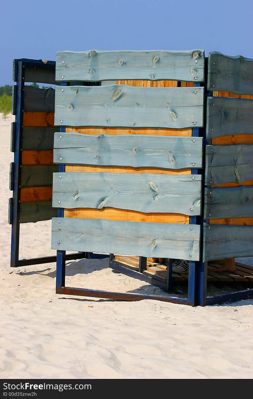 Beach cabin in sandy coastline