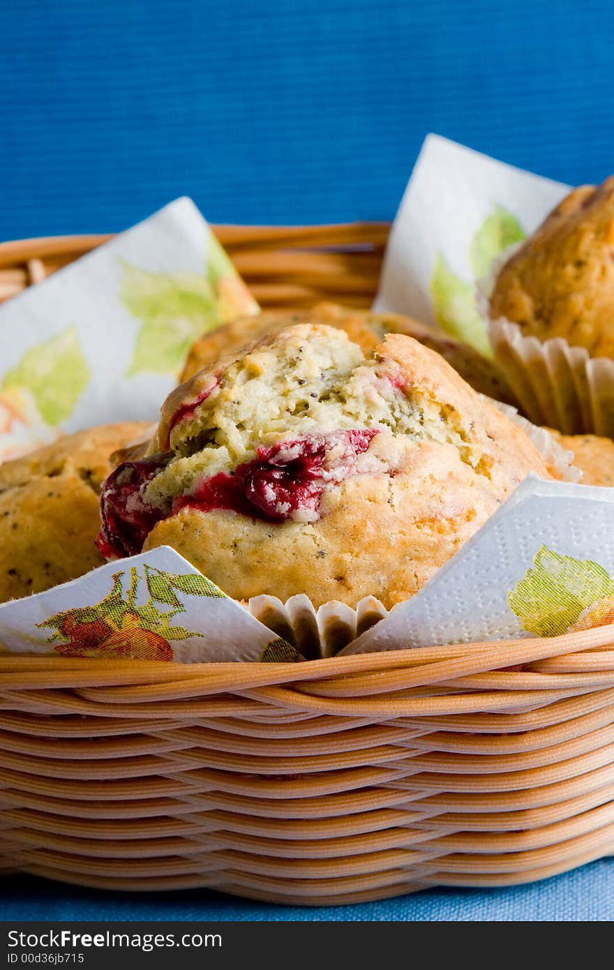 Fresh and tasty handmade muffins in the woven basket