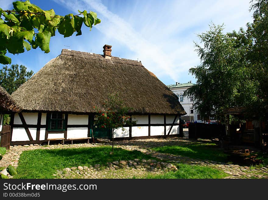 Traditional Polish checked houses, straw roofs. Traditional Polish checked houses, straw roofs.