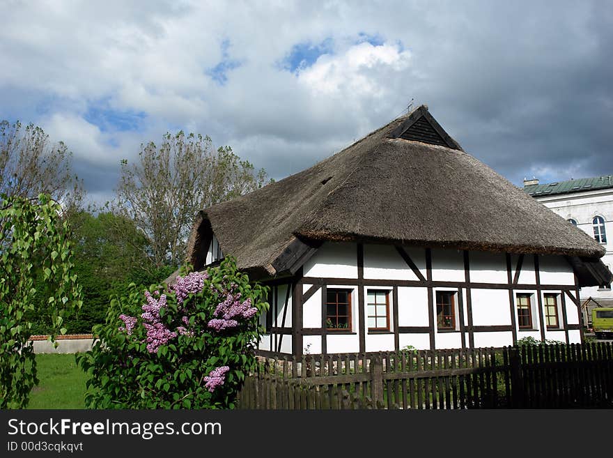 Traditional Polish checked houses, straw roofs. Traditional Polish checked houses, straw roofs.