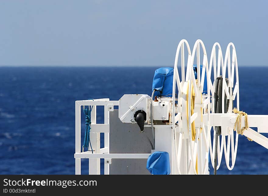 White reels for a moving ramp on a ship