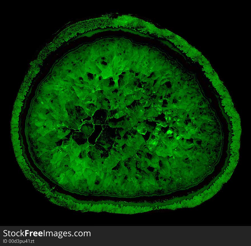 Abstract illustration with green crystals inside of a rock