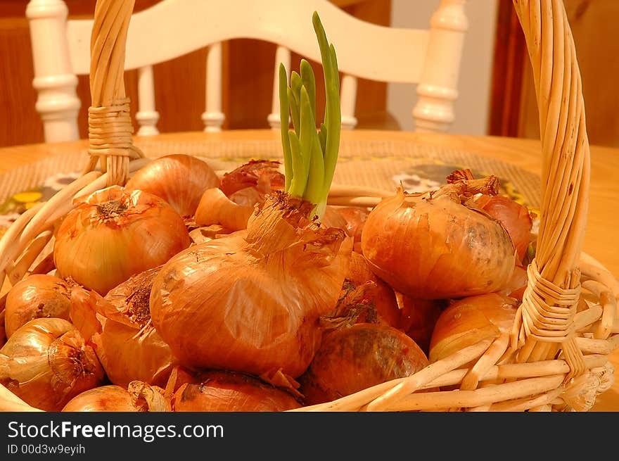 Onions are heaped-up. Close-up of onions. Looking tasty.