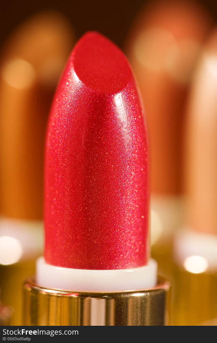 Close-up of a lipstick against a color background