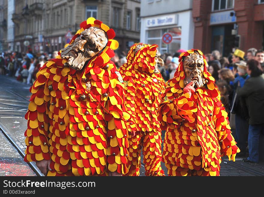 Colorful figures on carnival in gerany. I think the colors will symbolize the colors of the federal state. A funy group!. Colorful figures on carnival in gerany. I think the colors will symbolize the colors of the federal state. A funy group!