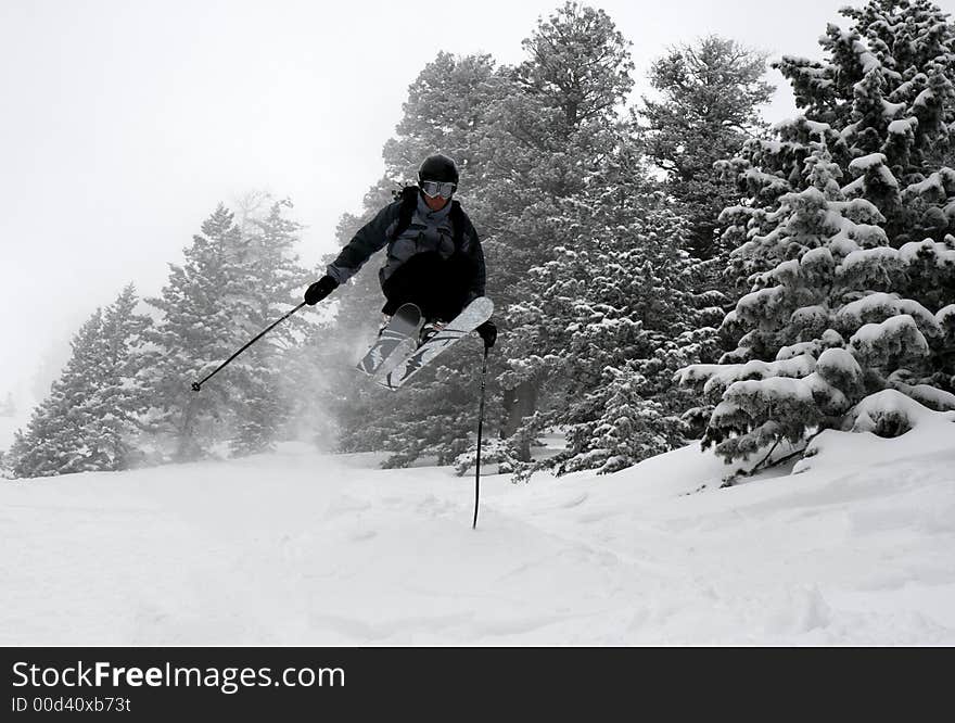 Skier airborne in the backcountry