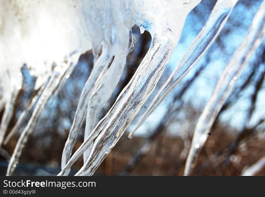 Frozen icicles with blue tones. Frozen icicles with blue tones