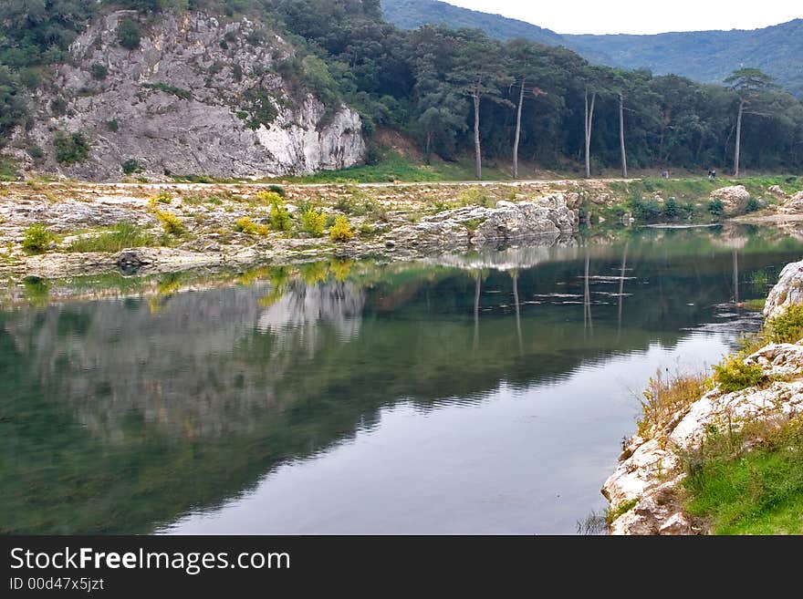 The river about the well-known antique aqueduct. The river about the well-known antique aqueduct