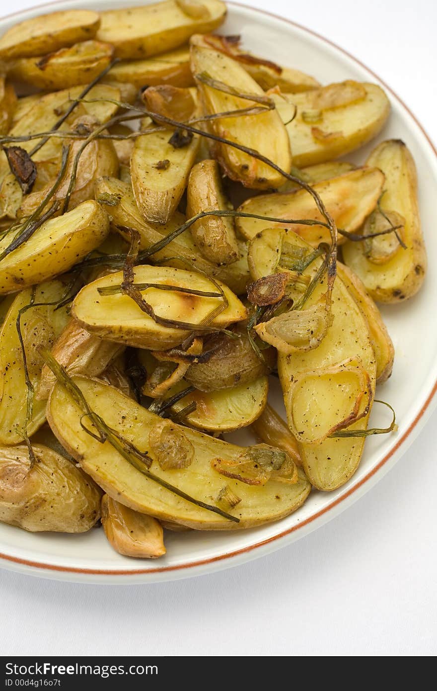 Roasted FIngerling Potatos with Green onions, roasted shallots, and Roasted Garlic,. Roasted FIngerling Potatos with Green onions, roasted shallots, and Roasted Garlic,