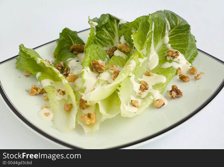 Salad with Romaine Lettuce, walnuts and Creamy Ranch Dressing. Salad with Romaine Lettuce, walnuts and Creamy Ranch Dressing