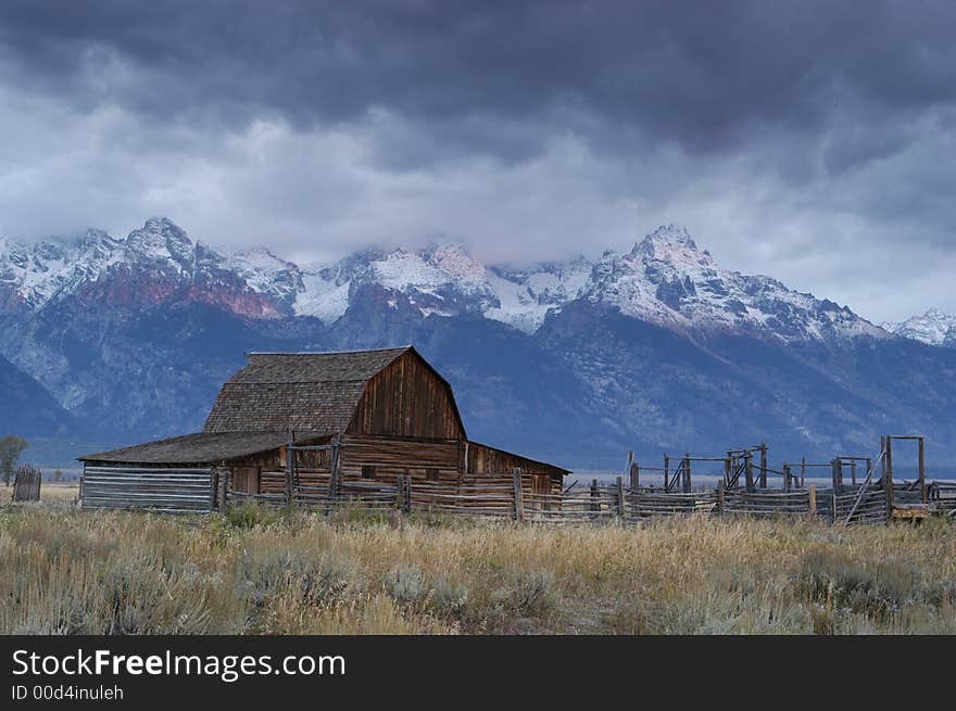 Old abandoned barn at foothills of the Grand Tetons Mountain Range