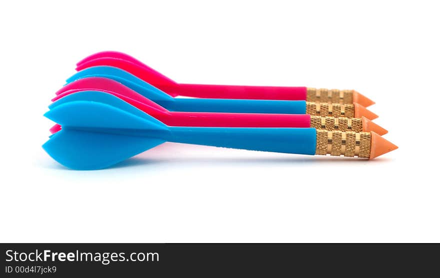 Isolated photo of row of red and blue toy darts.