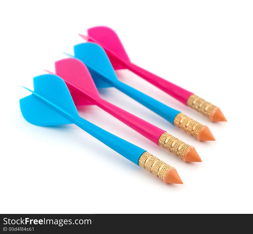 Isolated photo of row of red and blue toy darts.