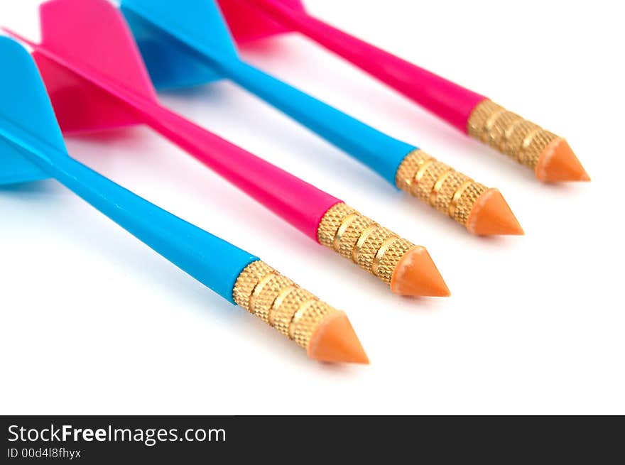 Isolated photo of row of red and blue toy darts.