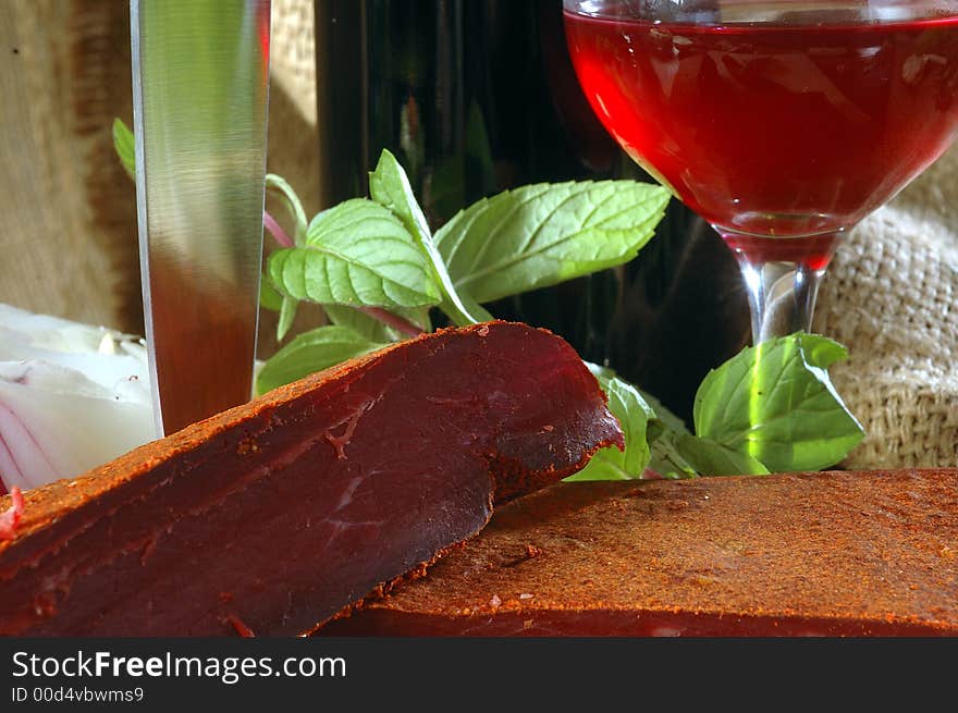 Still life with meat and wine