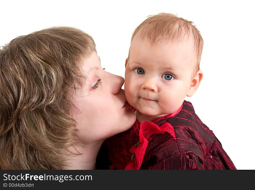 Portrait of mother kissing her little girl, isolated on white background. Portrait of mother kissing her little girl, isolated on white background