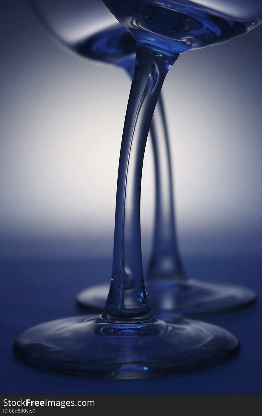 Two crooked glass toned in blue. Two crooked glass toned in blue