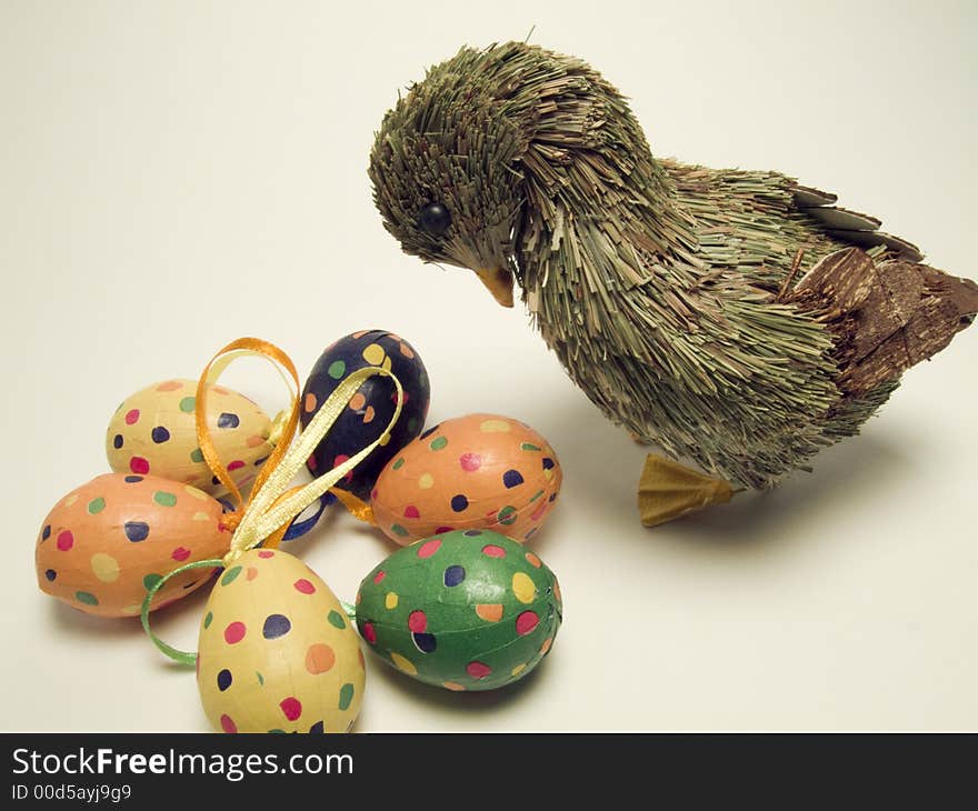 Colorful easter eggs and a duck to welcome Ester time. Colorful easter eggs and a duck to welcome Ester time