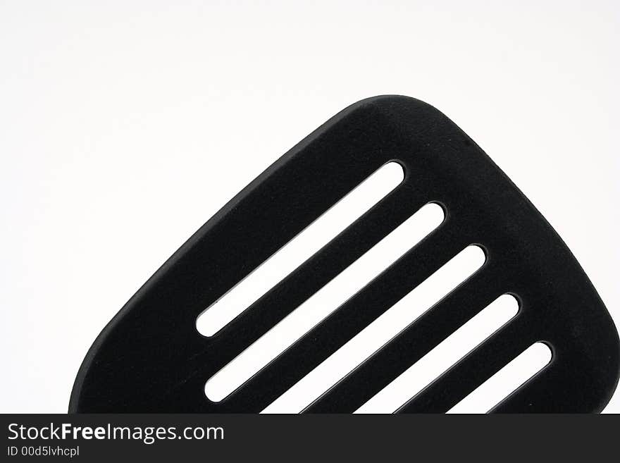 An image of a plastic spatula