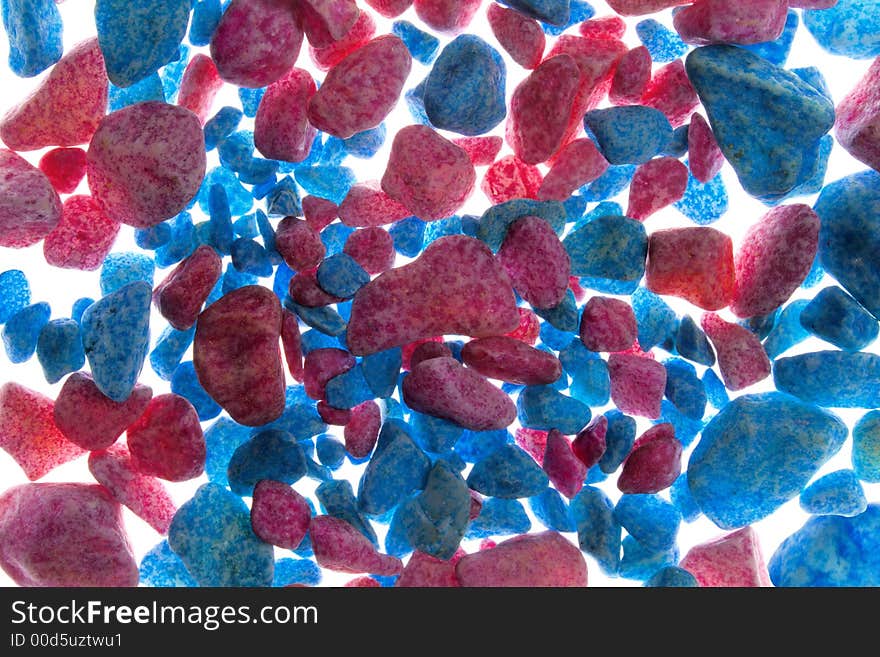 Red-blue background of a painted gravel. Red-blue background of a painted gravel