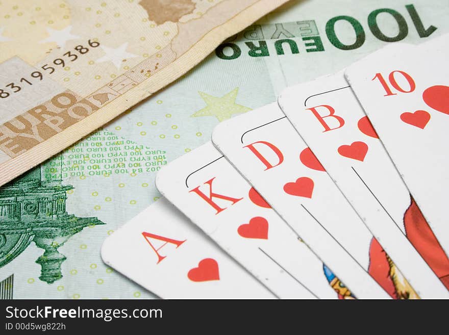 Game cards lying on Euro banknotes. Game cards lying on Euro banknotes.