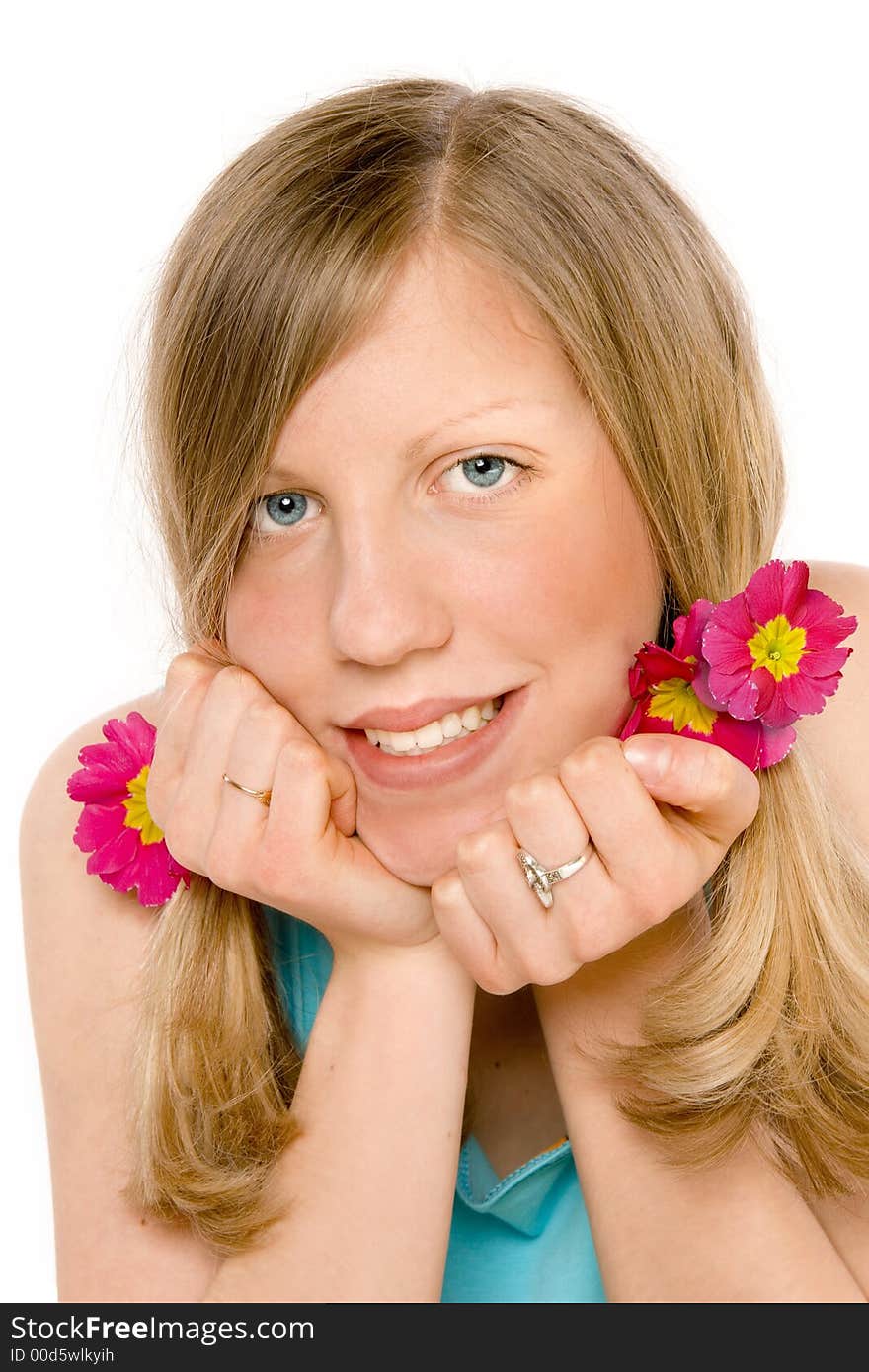 Portrait of a beautiful girl with flowers hairstyle. Portrait of a beautiful girl with flowers hairstyle.