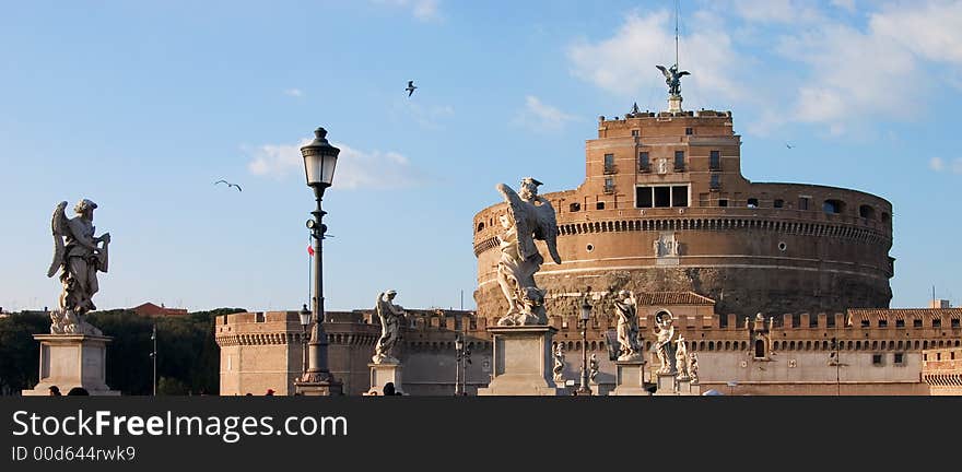 Angels on the bridge in front of Castle St. Angelo in Rome, Italy