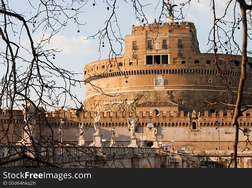 Castle St. Angelo in Rome, Italy framed by tree branches