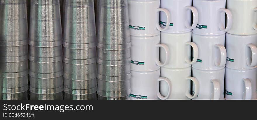 Rows and stacks of water and coffee cups