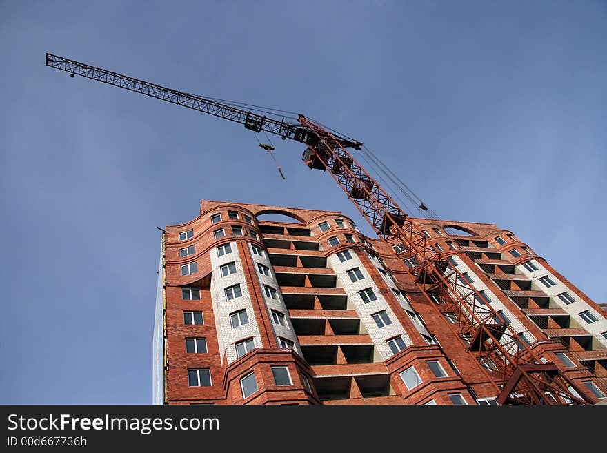 Construction of a new multi-storey brick building.