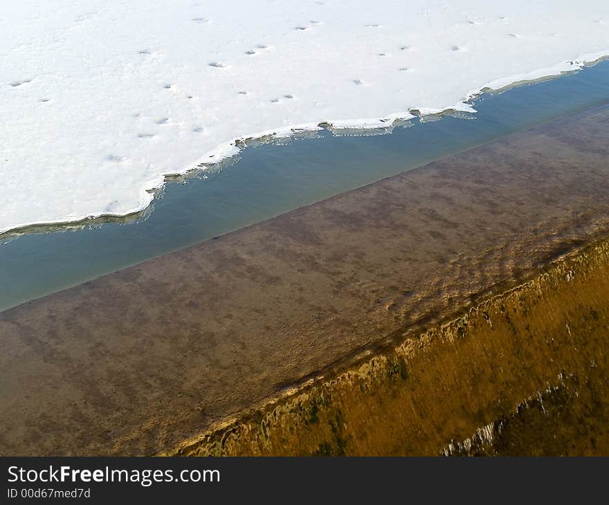 An abstract type photo of water and ice near a waterfall. An abstract type photo of water and ice near a waterfall.