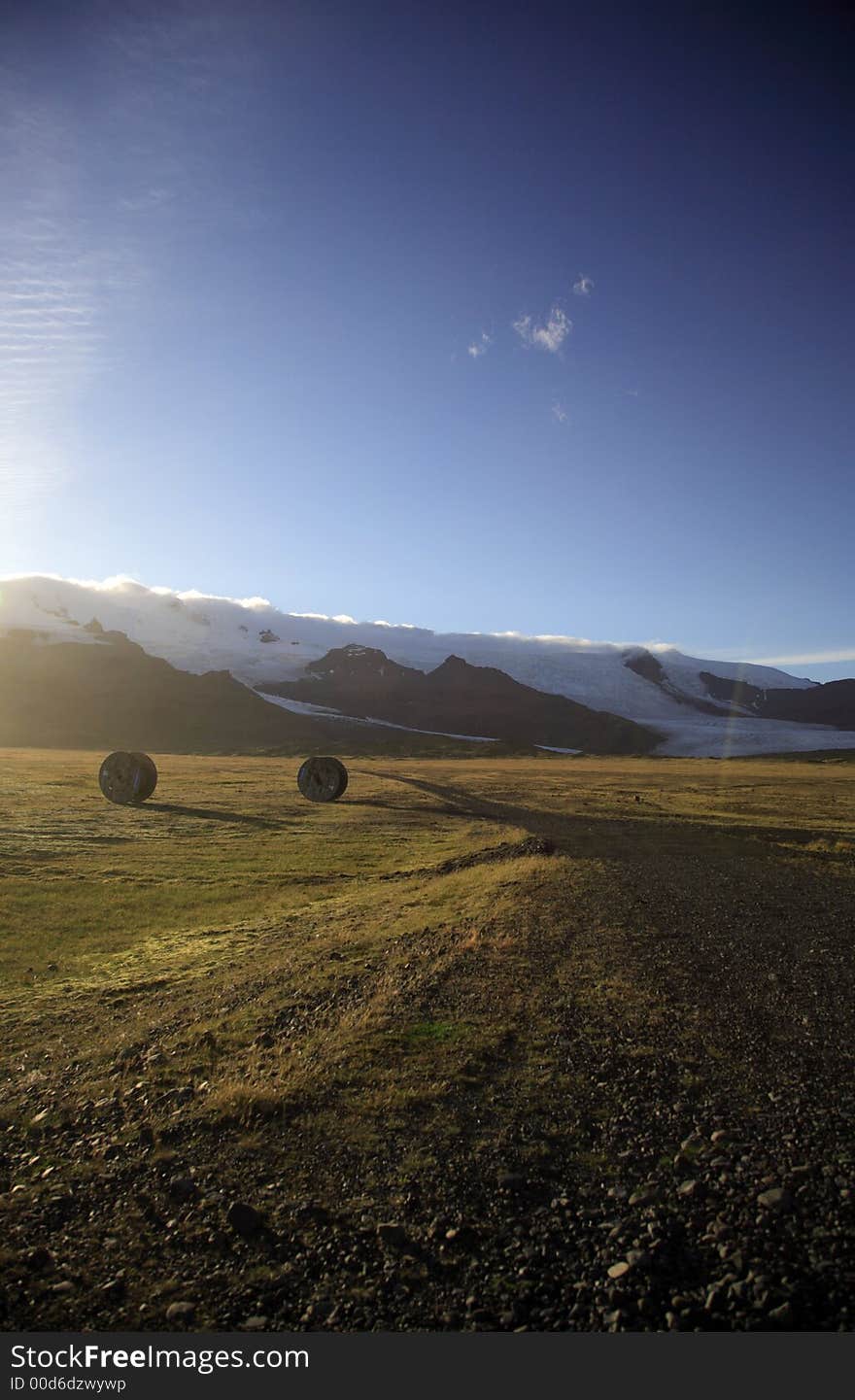 Straw bales lit by sunlight