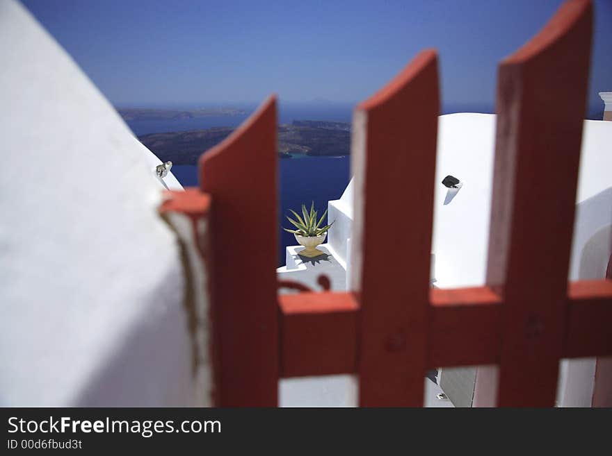 View of Caldera through a gate Santorini Greece