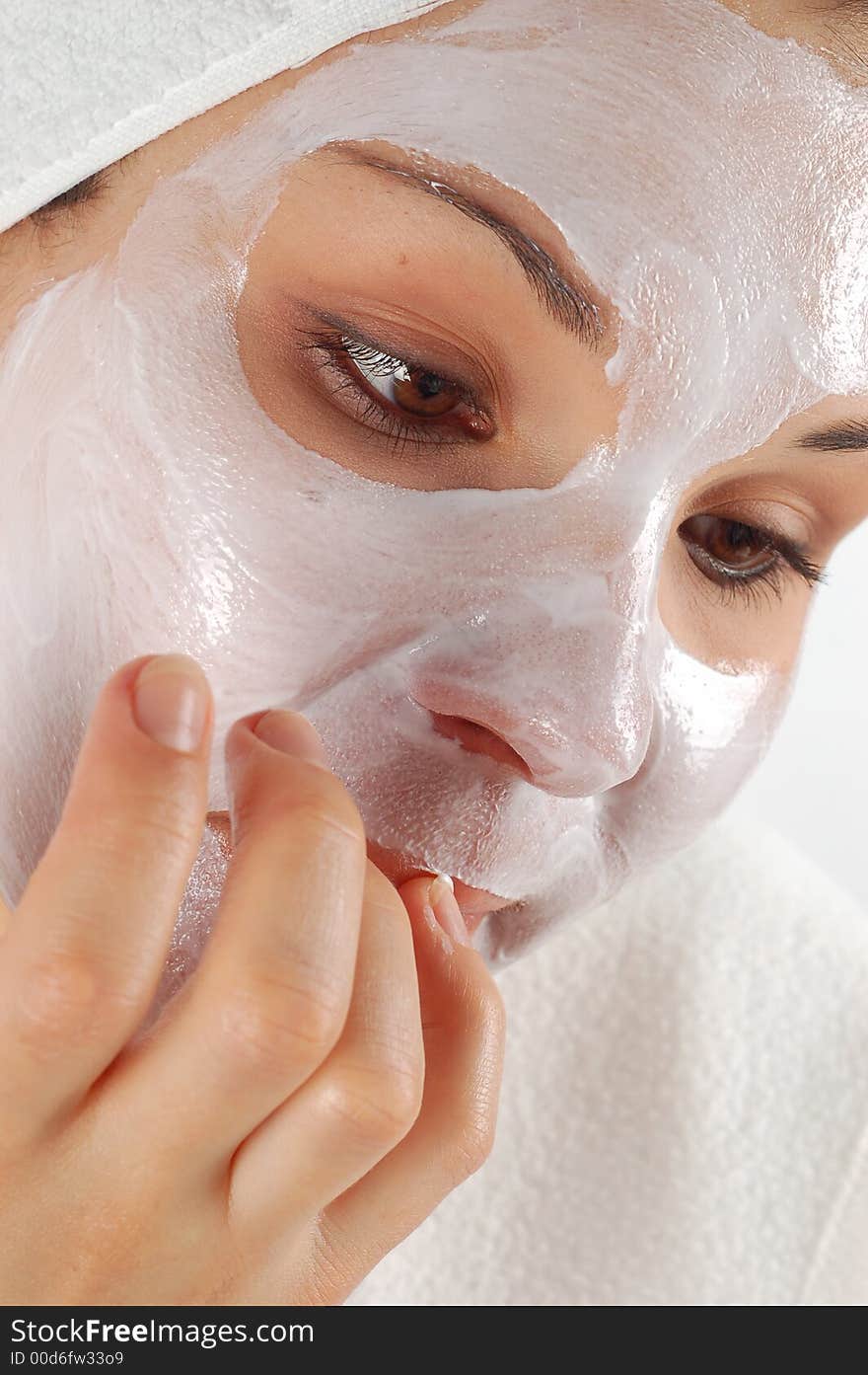 Attractive woman with facial mask. Attractive woman with facial mask