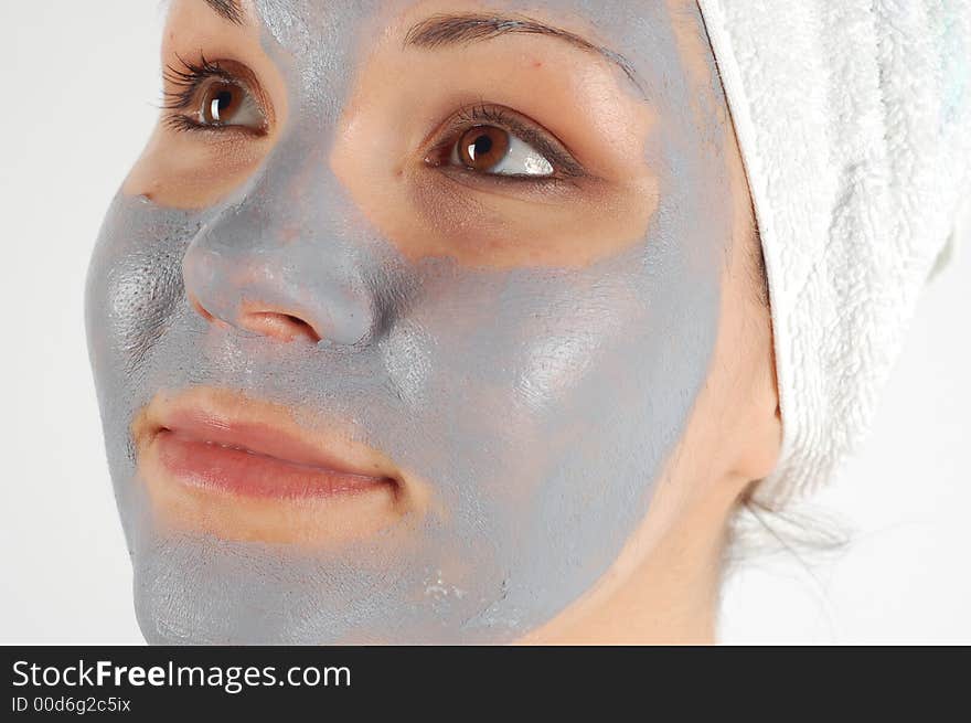 Attractive woman with facial mask. Attractive woman with facial mask