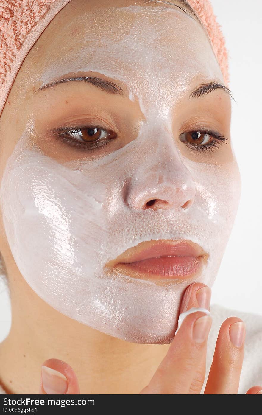 Attractive woman with facial mask. Attractive woman with facial mask