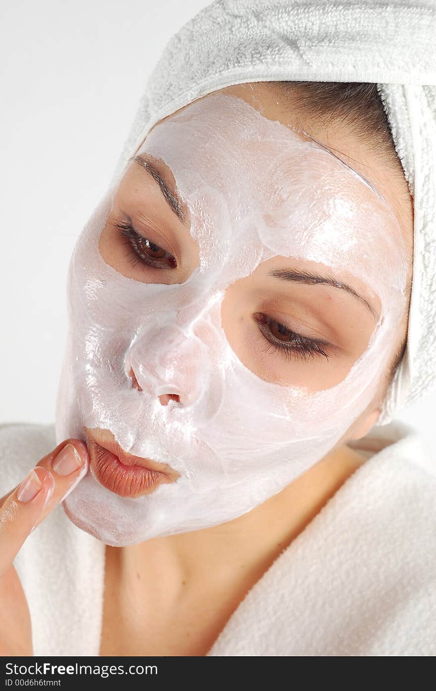 Attractive woman with facial mask. Attractive woman with facial mask