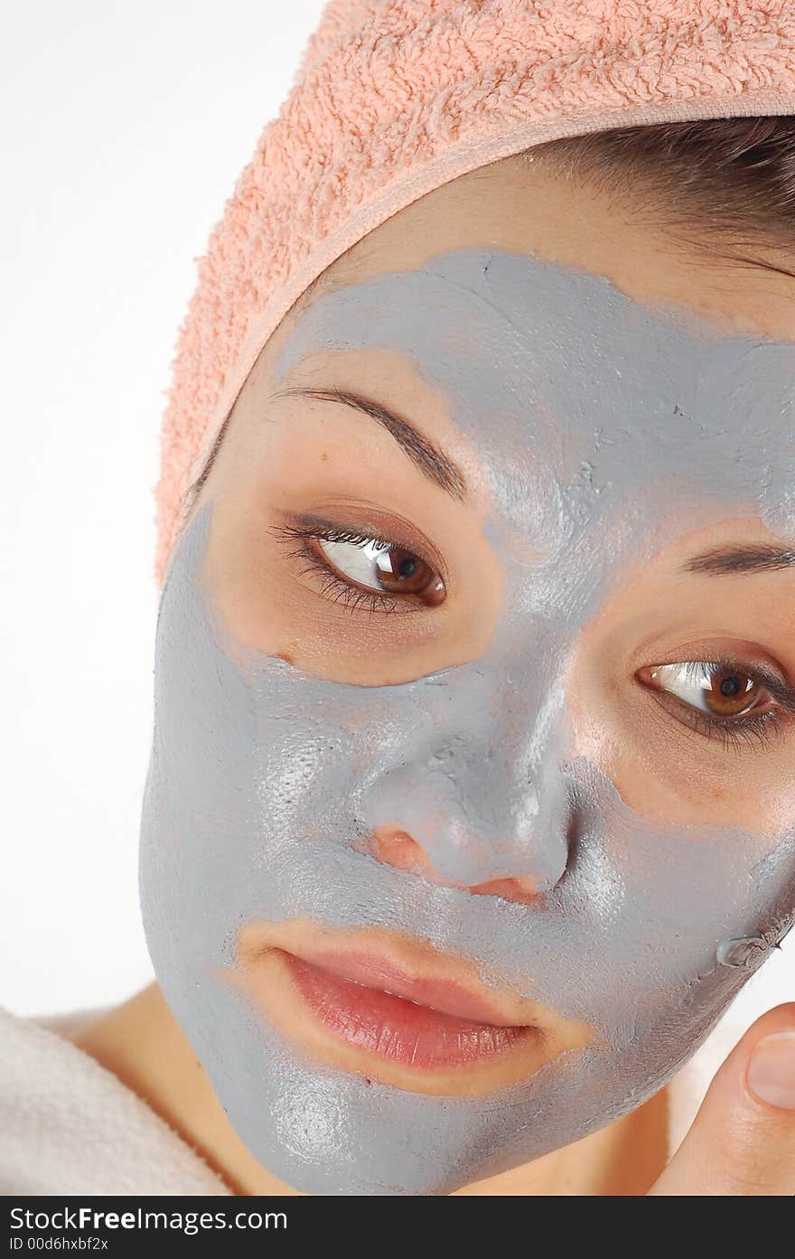 Attractive woman with facial mask. Attractive woman with facial mask