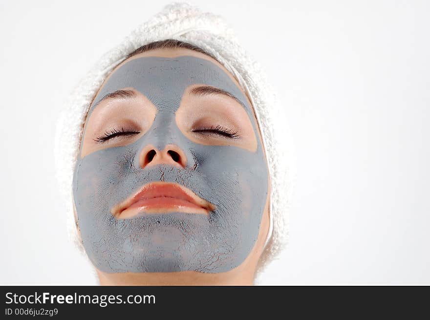 Attractive woman with facial mask. Attractive woman with facial mask