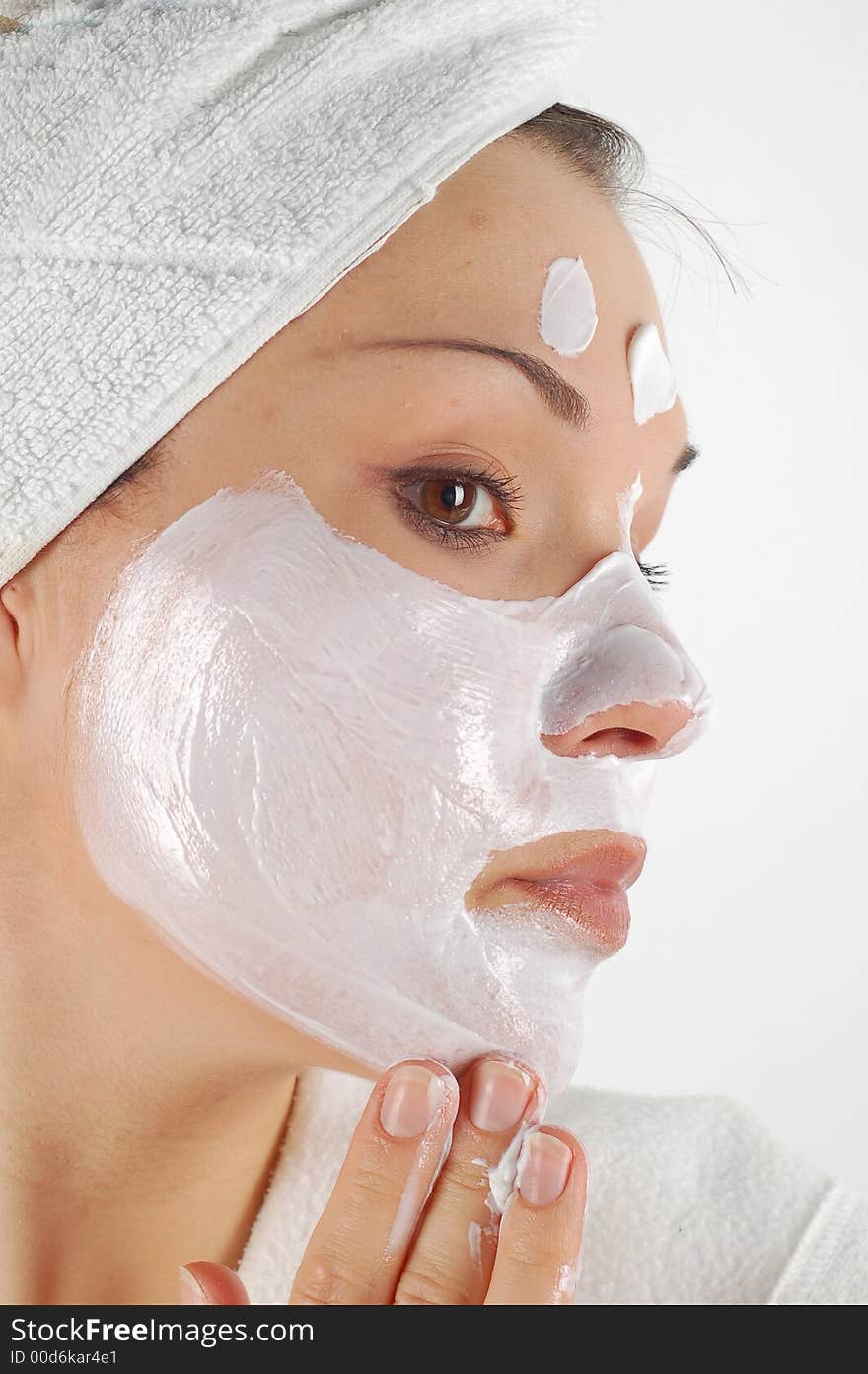 Attractive woman with facial mask. Attractive woman with facial mask