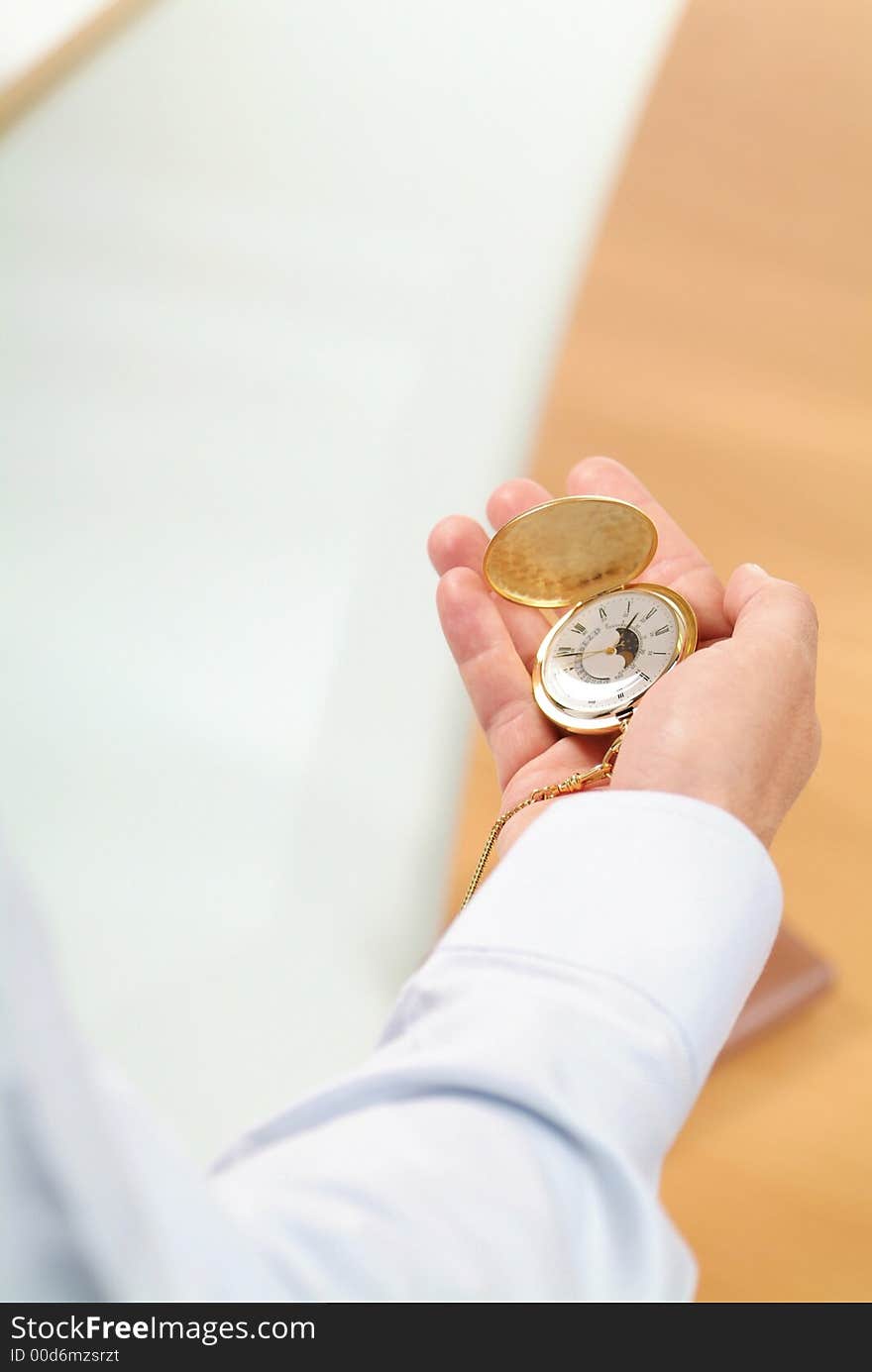 Hand with clock