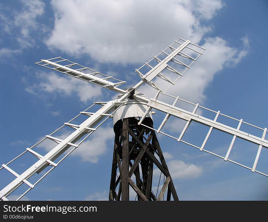 An old windpump on the Norfolk Broads in England. An old windpump on the Norfolk Broads in England