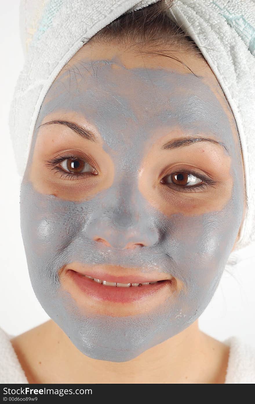 Attractive woman with facial mask. Attractive woman with facial mask