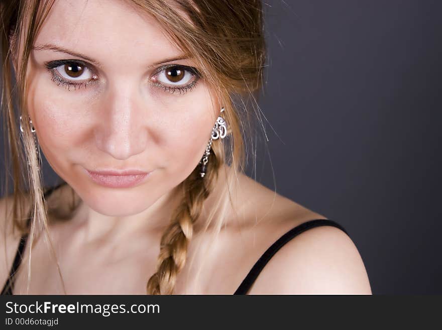 Pretty girl on gray background