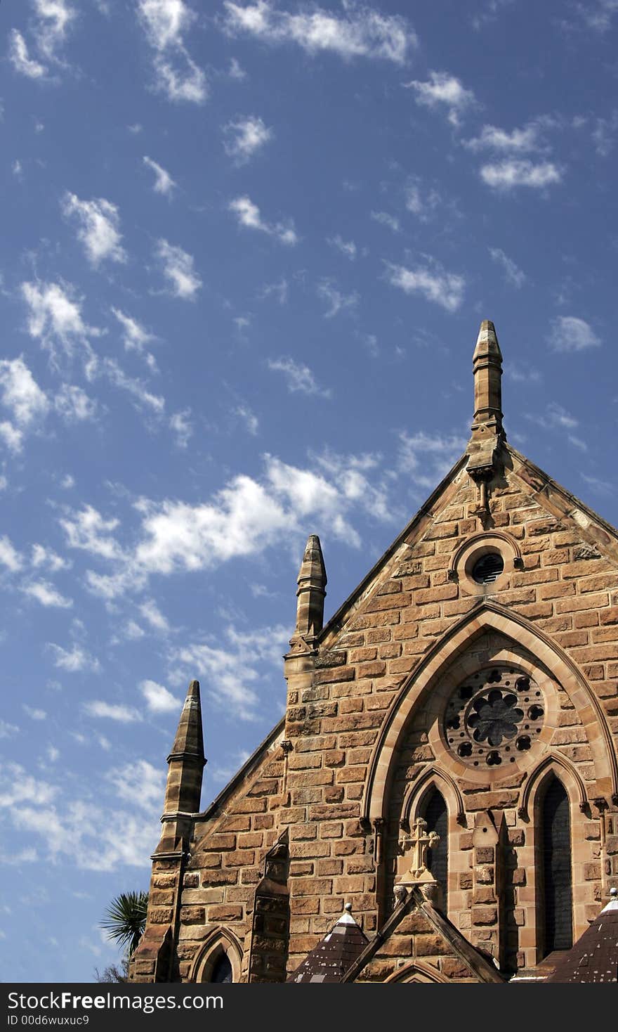 Old Stone Church Building Roof, Blue Sky With White Clouds, Sydney, Australia. Old Stone Church Building Roof, Blue Sky With White Clouds, Sydney, Australia