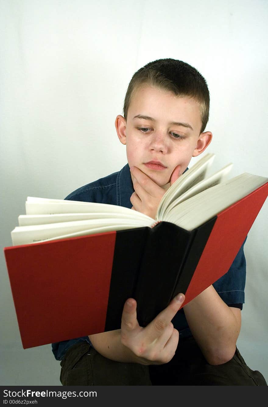 Portriat of Teenage Boy Reading