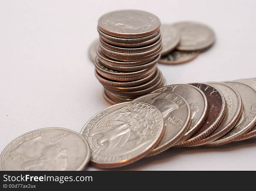 A stack of several different tipe of coins